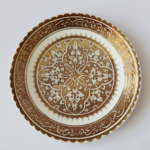 Handcrafted Persian lustreware plate in Ilkhanid style with geometric floral motifs and Omar Khayyam poetry, made in Winter 2025 by the Tavasolian Brothers Workshop