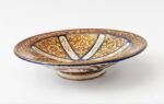 Full view of handmade Persian lustreware plate